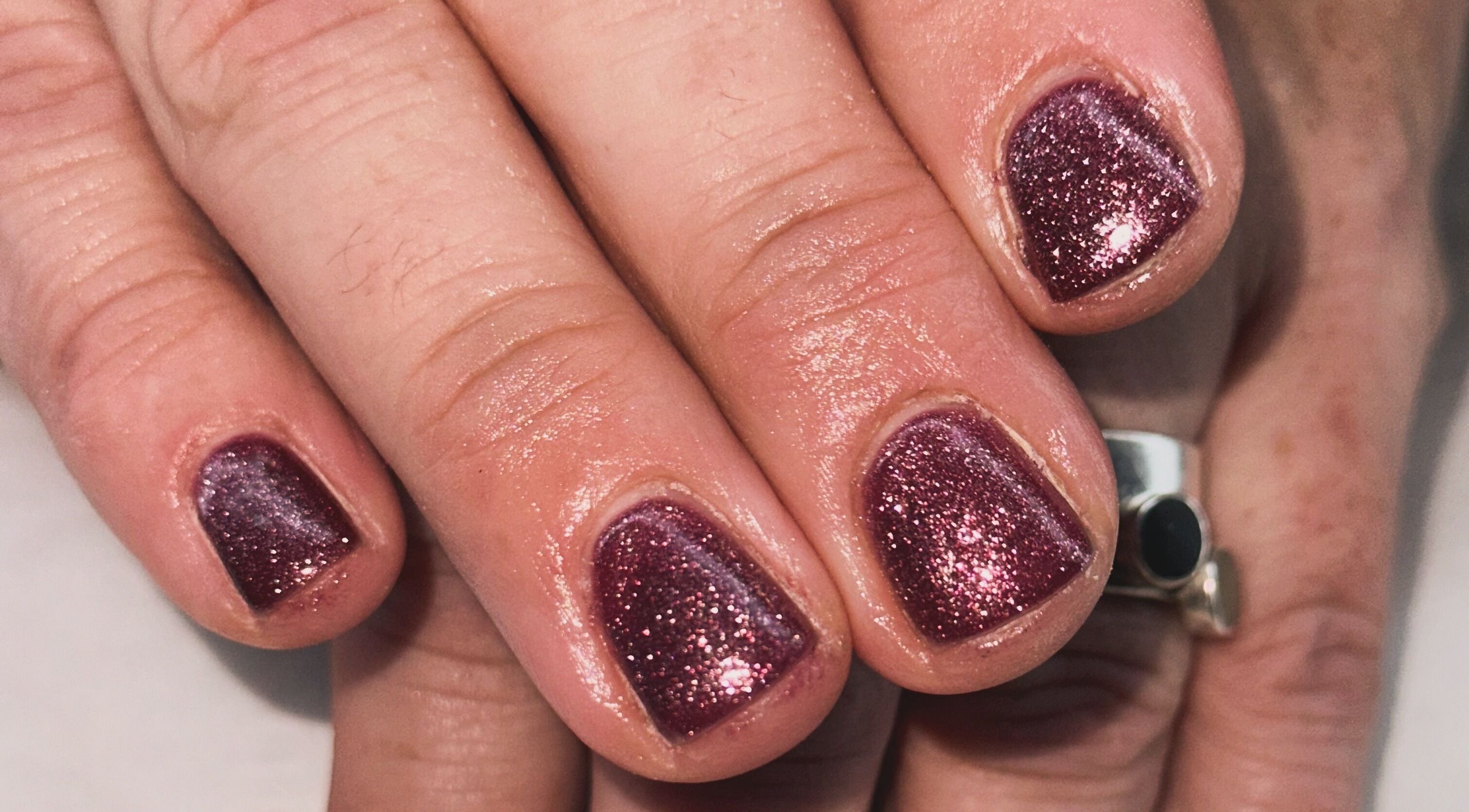 Sparkling nail polish at Sun Kissed Nail & Wax Studio, Thurso, Scotland, GB.