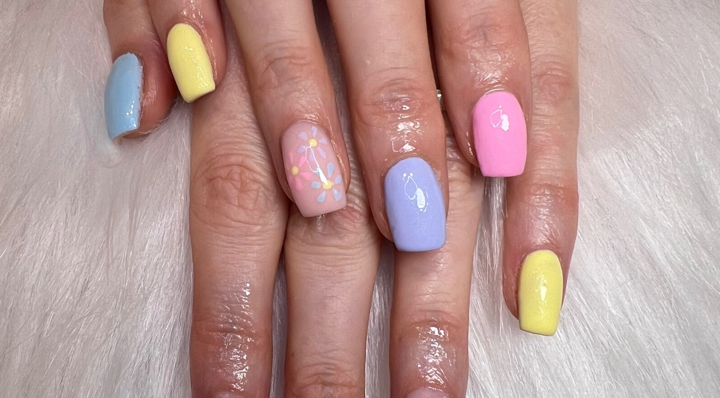 Colorful pastel nails with floral design at The Glitter Garage, Halifax, England, GB.