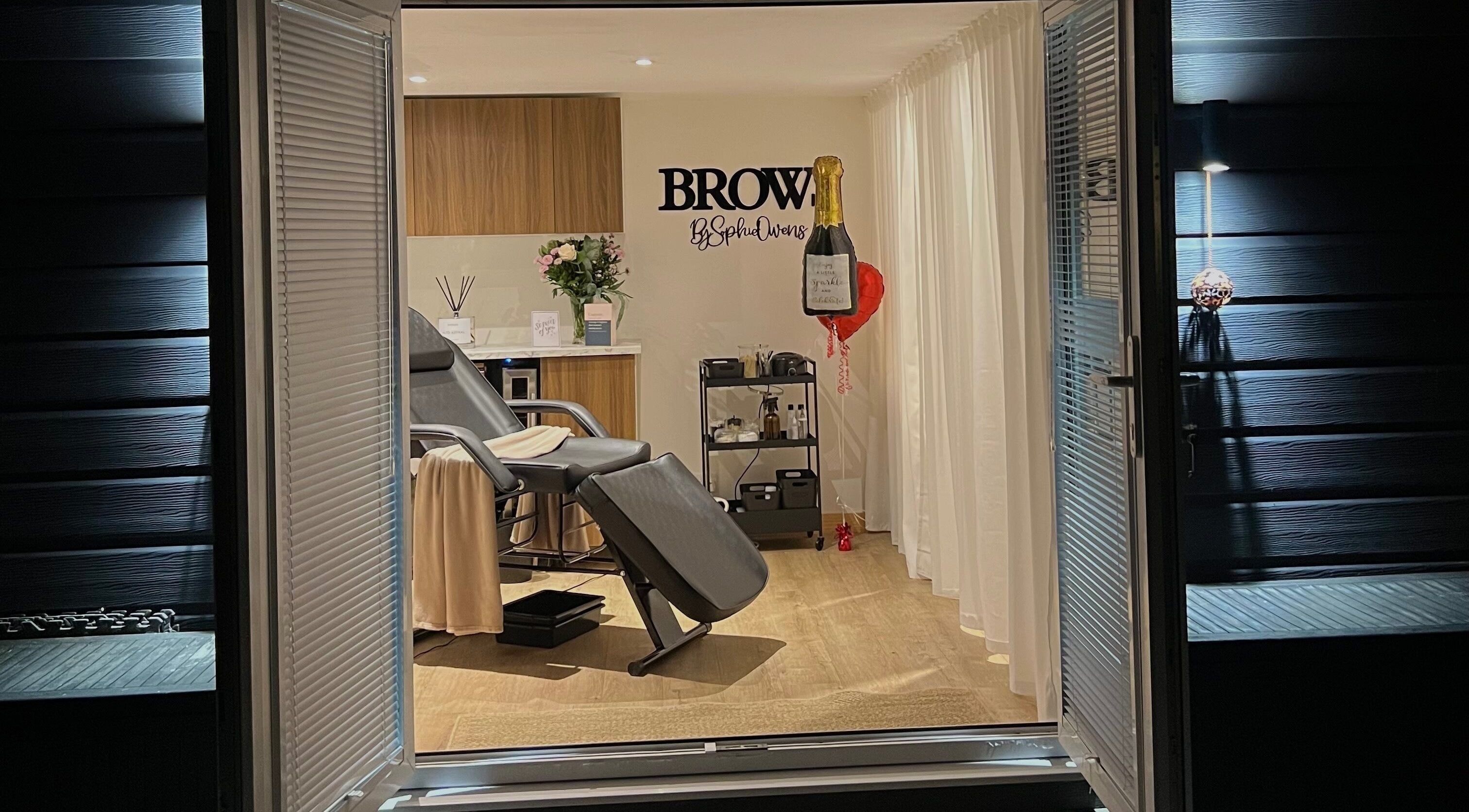 Elegant treatment room at Sophz Browz, Barry, Wales, GB, showcasing a plush chair and serene decor.