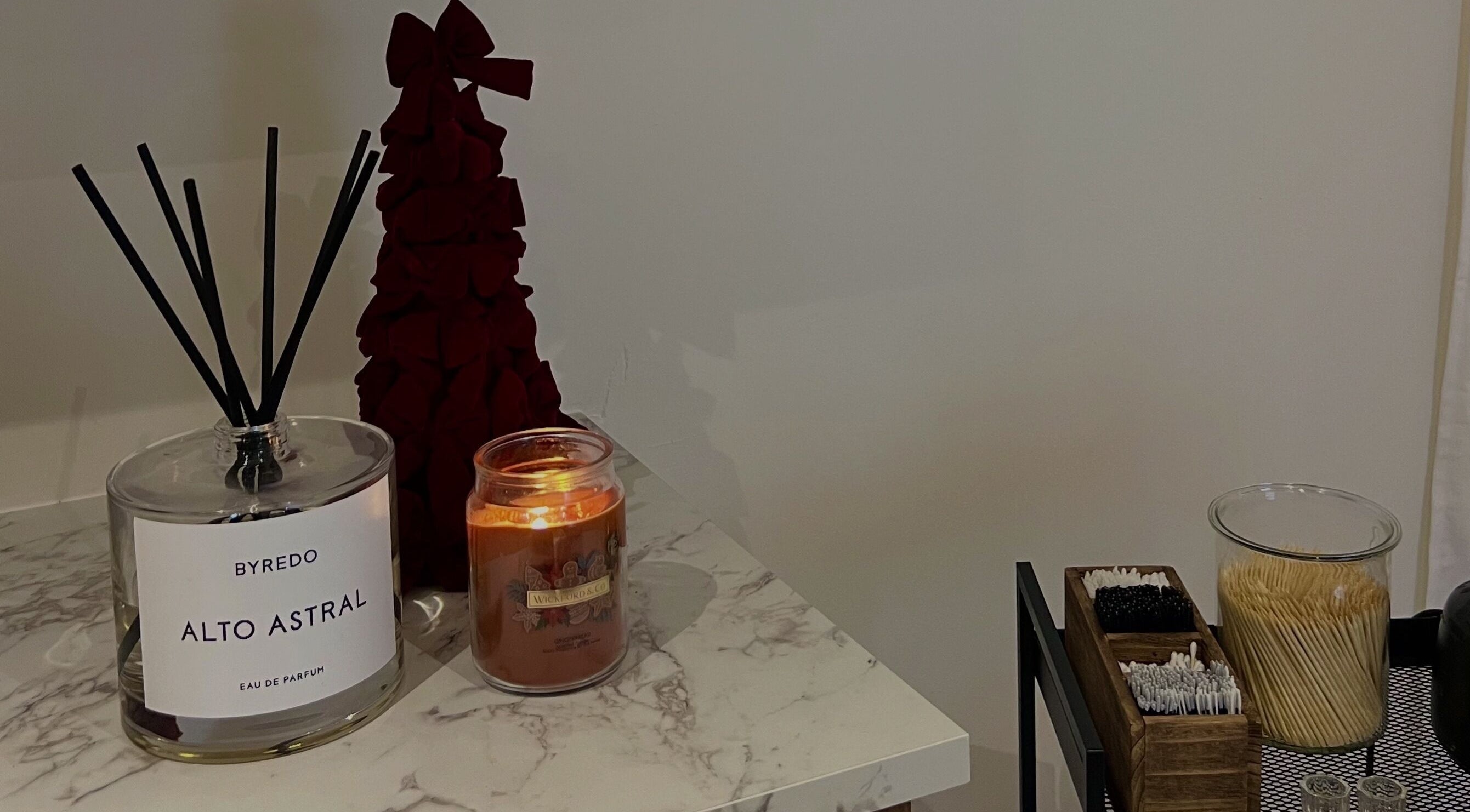 Elegant aroma setup with candles at Sophz Browz, Barry, Wales, GB enhancing relaxation.