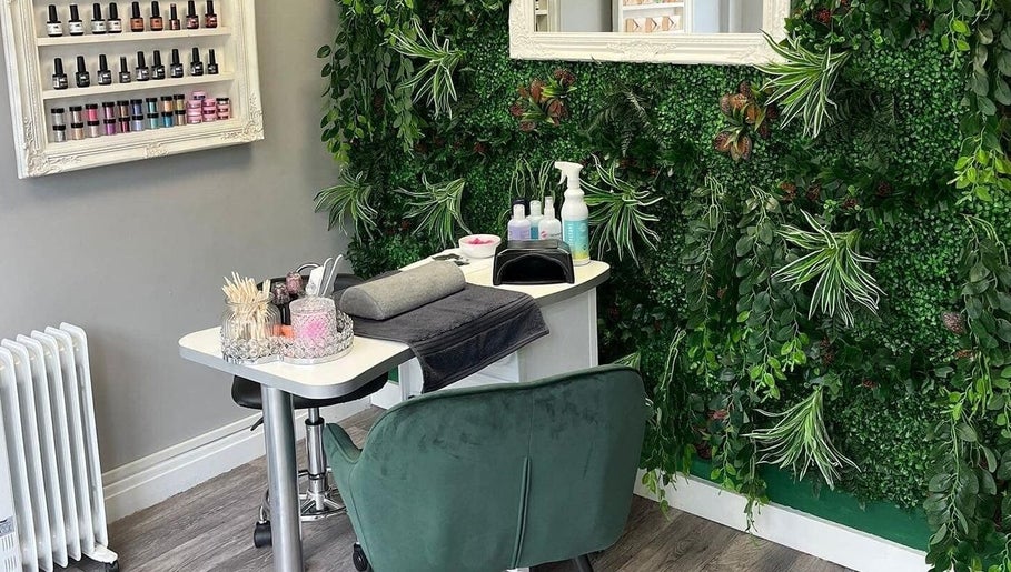 Tilly Rose Nails at The Beauty Lounge in Newcastle-under-Lyme, England. Elegant nail station with lush greenery.