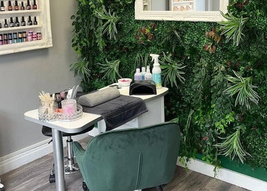 Tilly Rose Nails at The Beauty Lounge in Newcastle-under-Lyme, England. Elegant nail station with lush greenery.
