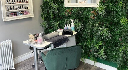 Tilly Rose Nails at The Beauty Lounge in Newcastle-under-Lyme, England. Elegant nail station with lush greenery.