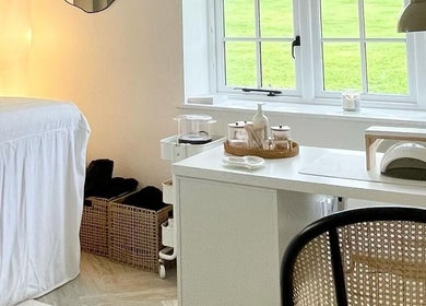 Relaxing treatment room at The Lookery Beauty Room, Milton Keynes, England. Bright, serene, and inviting space.