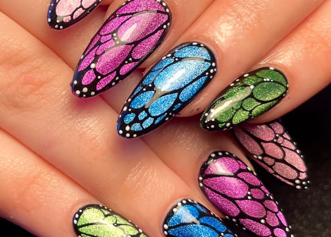 Colorful butterfly nail design at Get Nailed by Molly, Liverpool, England, GB.