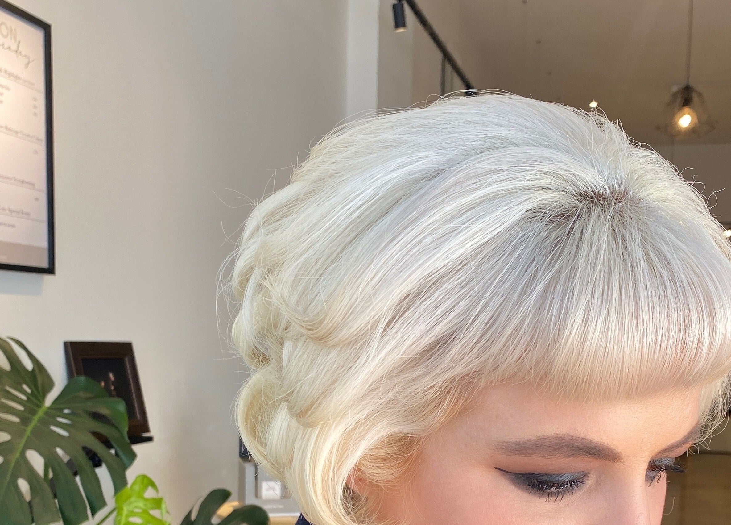 Stylish platinum blonde haircut at Hair By Kisha at Hairsalon Faraday, Auckland, Auckland, NZ.