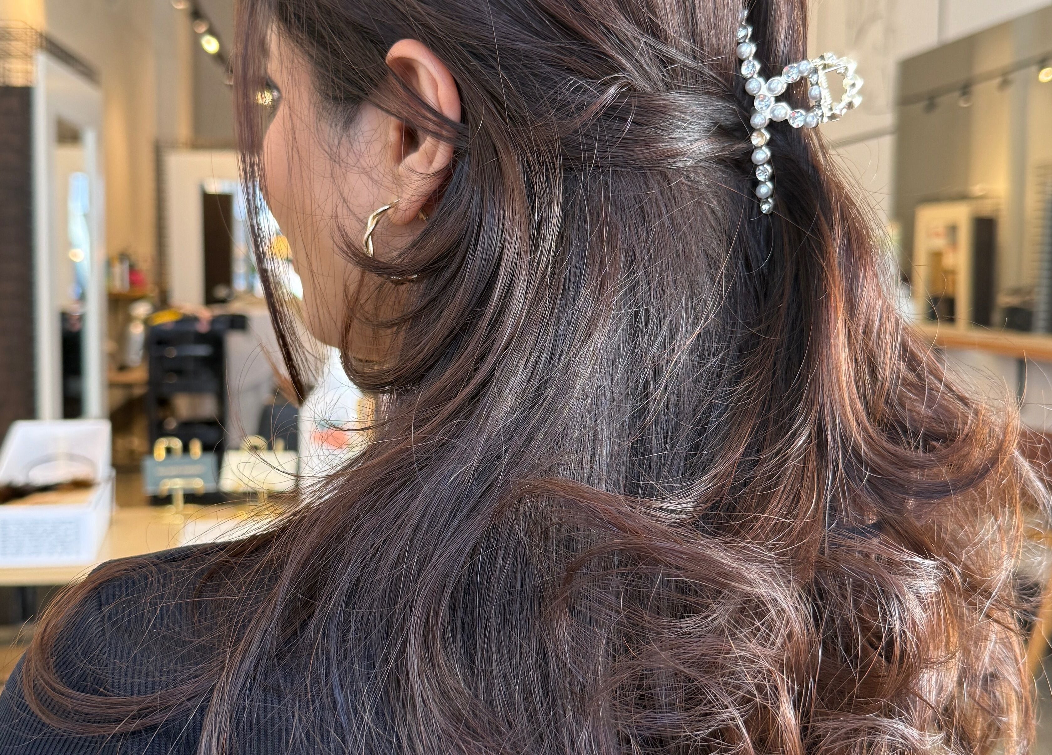 Elegant hairstyle with jewel accessory at Hair By Kisha at Hairsalon Faraday in Auckland, Auckland, NZ.