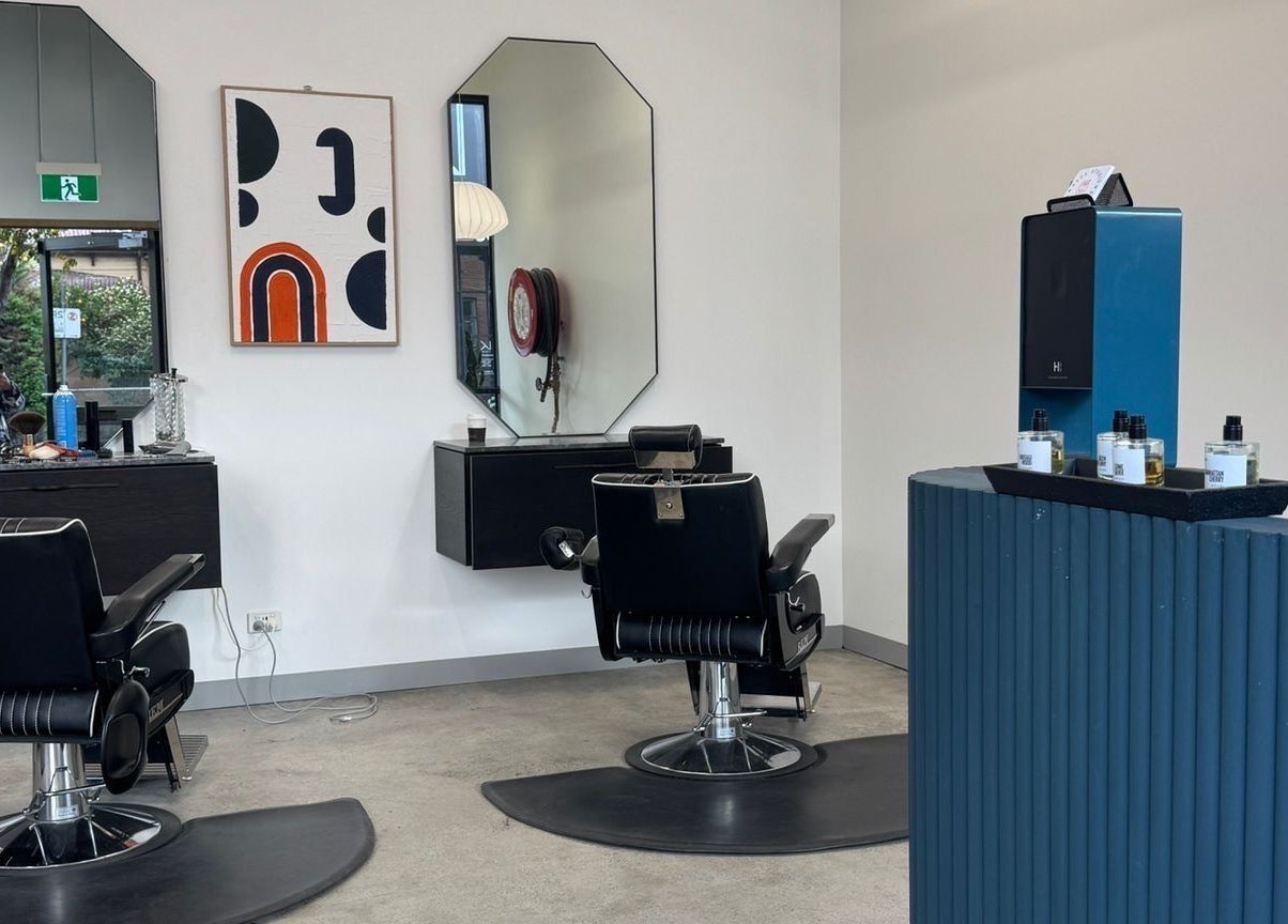 Elegant salon interior at 3121 Studio in Melbourne, Victoria, AU with modern chairs and stylish decor.