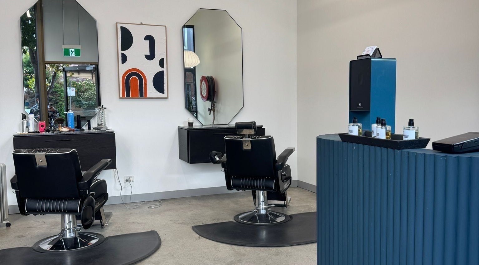 Elegant salon interior at 3121 Studio in Melbourne, Victoria, AU with modern chairs and stylish decor.
