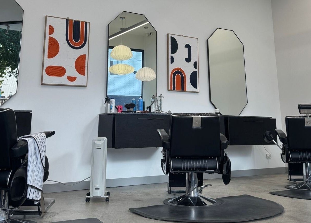 Chic salon chairs and mirrors at 3121 Studio, Melbourne, Victoria, AU, featuring stylish decor and lighting.