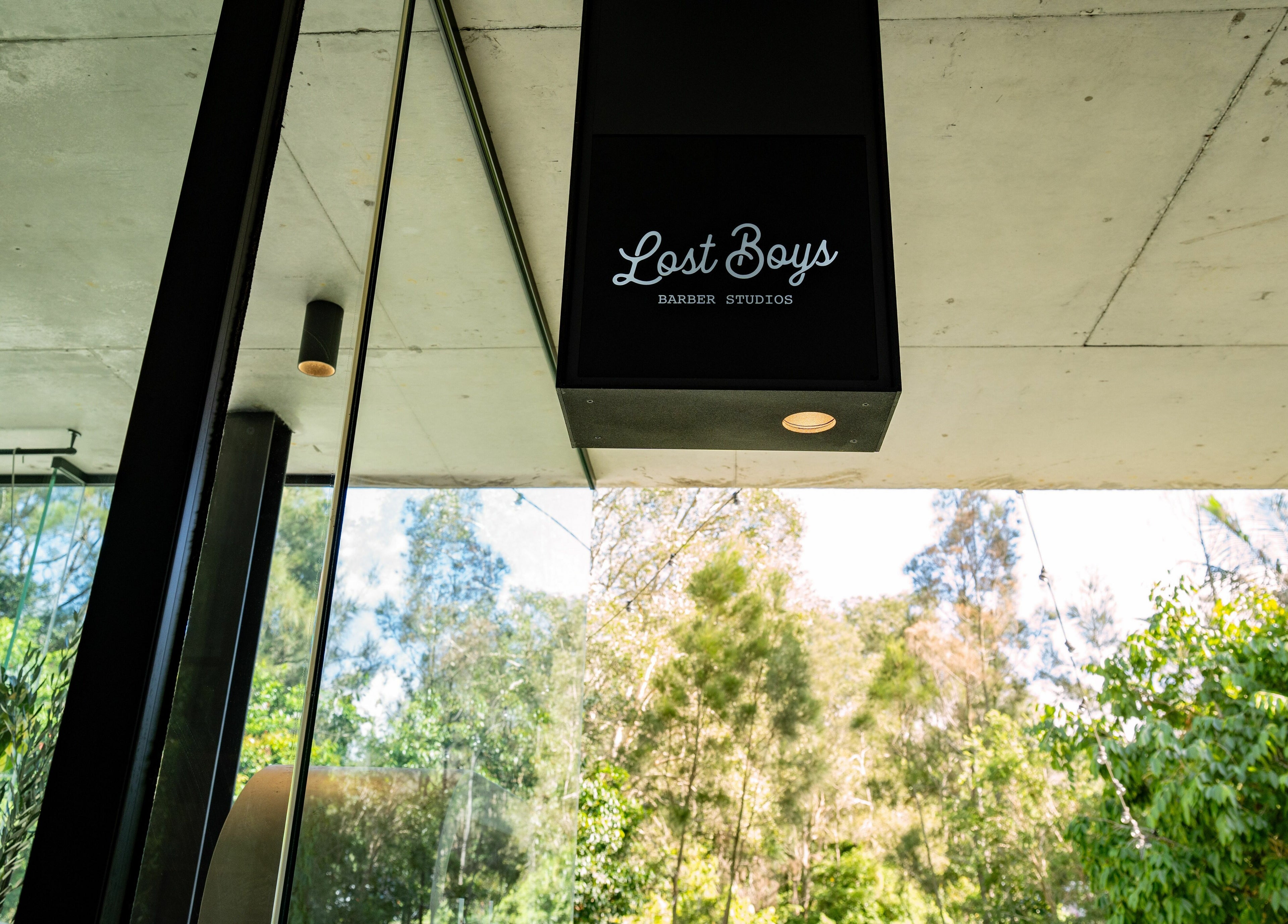 Lost Boys Tugun entrance sign amidst lush greenery at Tugun, Queensland, AU.