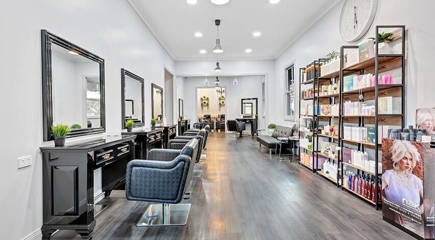 Zigbis Hair & Beauty salon in South Toowoomba, Queensland, AU. Modern chairs, sleek mirrors, elegant design.