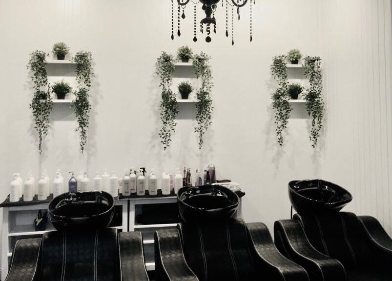Elegant wash stations at Zigbis Hair & Beauty, South Toowoomba, Queensland, AU, highlighting modern design.