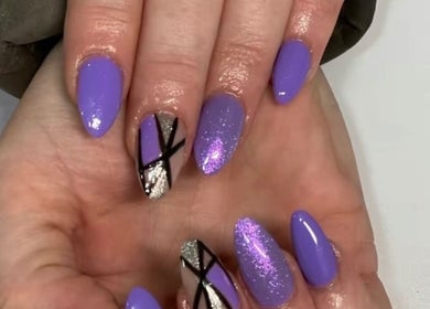 Lavender glitter nails with geometric art at Star Nail Riddrie, Glasgow, Scotland, GB showcasing unique designs.