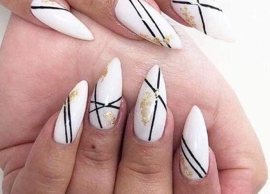 Elegant white nails with gold accents at Star Nail Riddrie, Glasgow, Scotland, GB.