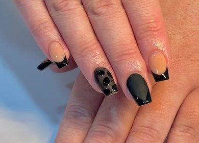 Stylish black nail art at Star Nail Riddrie, Glasgow, Scotland, GB. Elegant and modern design for all occasions.