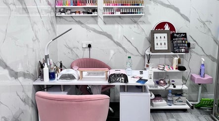 Nail station at Star Nail Riddrie in Glasgow, Scotland, GB featuring tools, polish, and stylish seating.