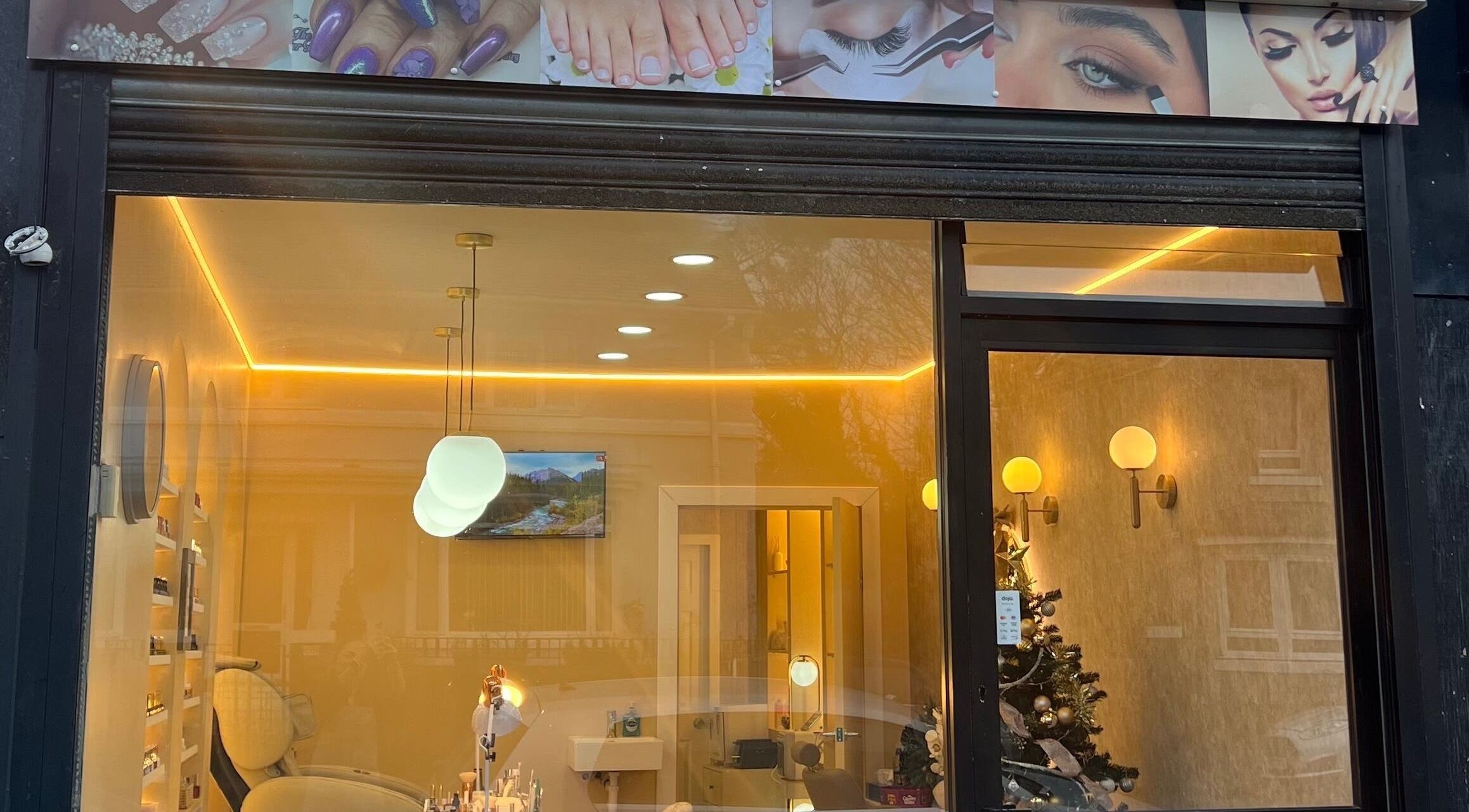 Front view of Star Nail & Beauty Riddrie in Glasgow, Scotland, GB, showcasing modern interior lighting.