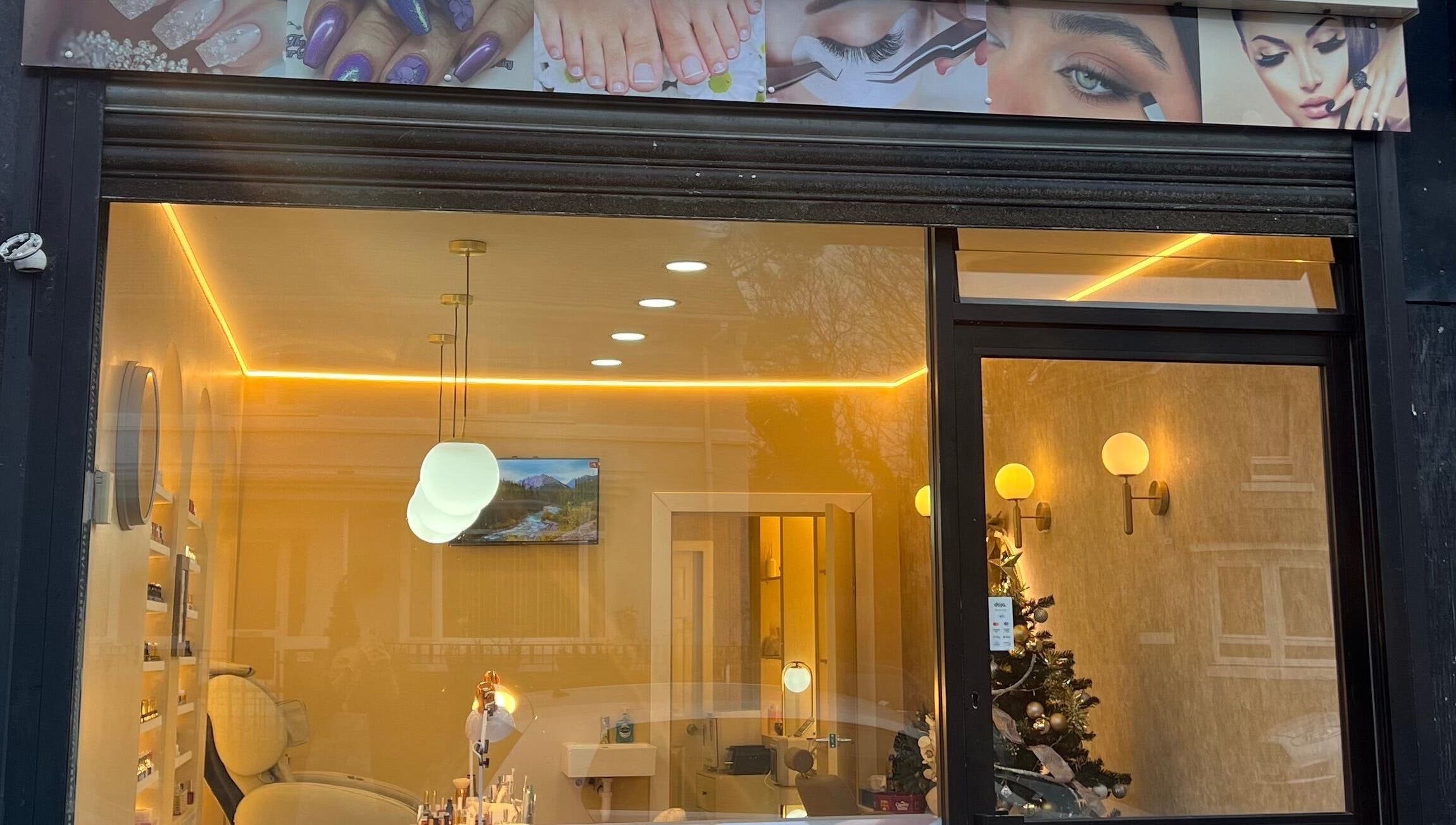 Front view of Star Nail & Beauty Riddrie in Glasgow, Scotland, GB, showcasing elegant interior lighting.