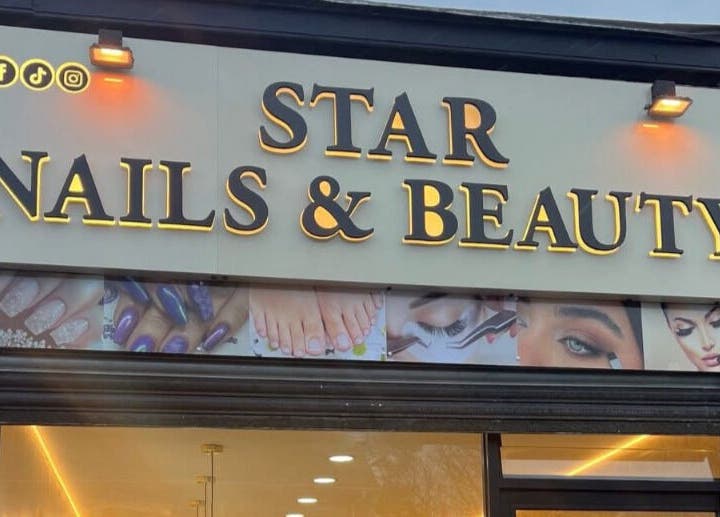 Front view of Star Nail & Beauty Riddrie signage in Glasgow, Scotland, GB, showcasing beauty services.