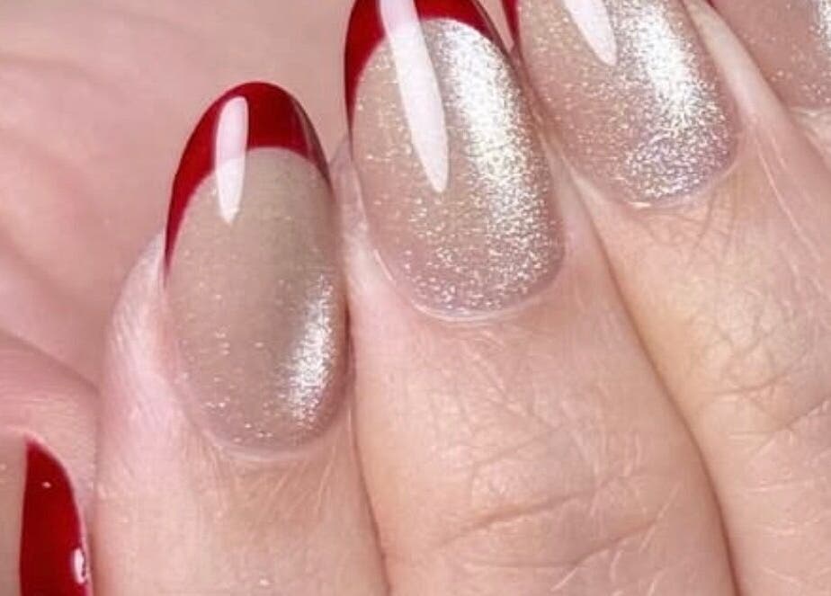 Elegant red French manicure at Star Nail & Beauty Riddrie, Glasgow, Scotland, GB.