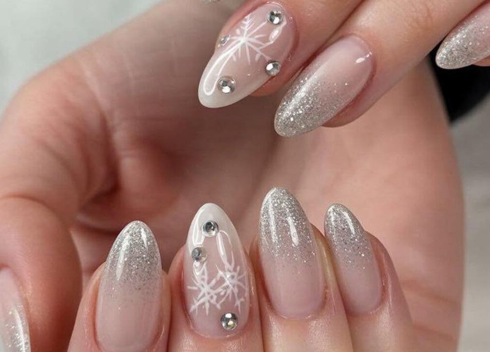 Elegant glitter nail art at Star Nail & Beauty Riddrie in Glasgow, Scotland, GB.