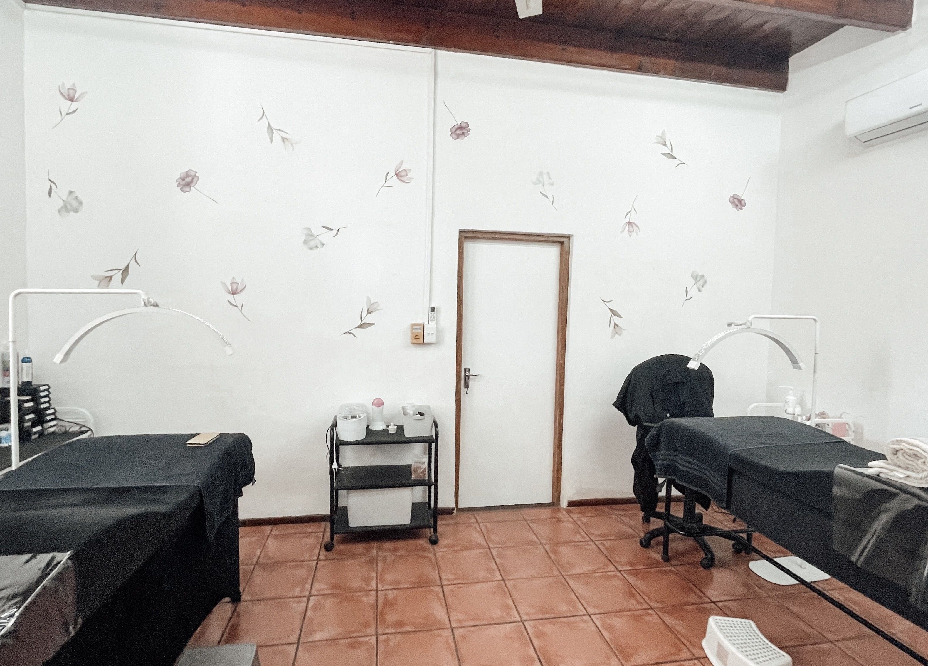 Peaceful treatment room at Winelands Body Aesthetics, Wellington, Western Cape, ZA with calming decor.