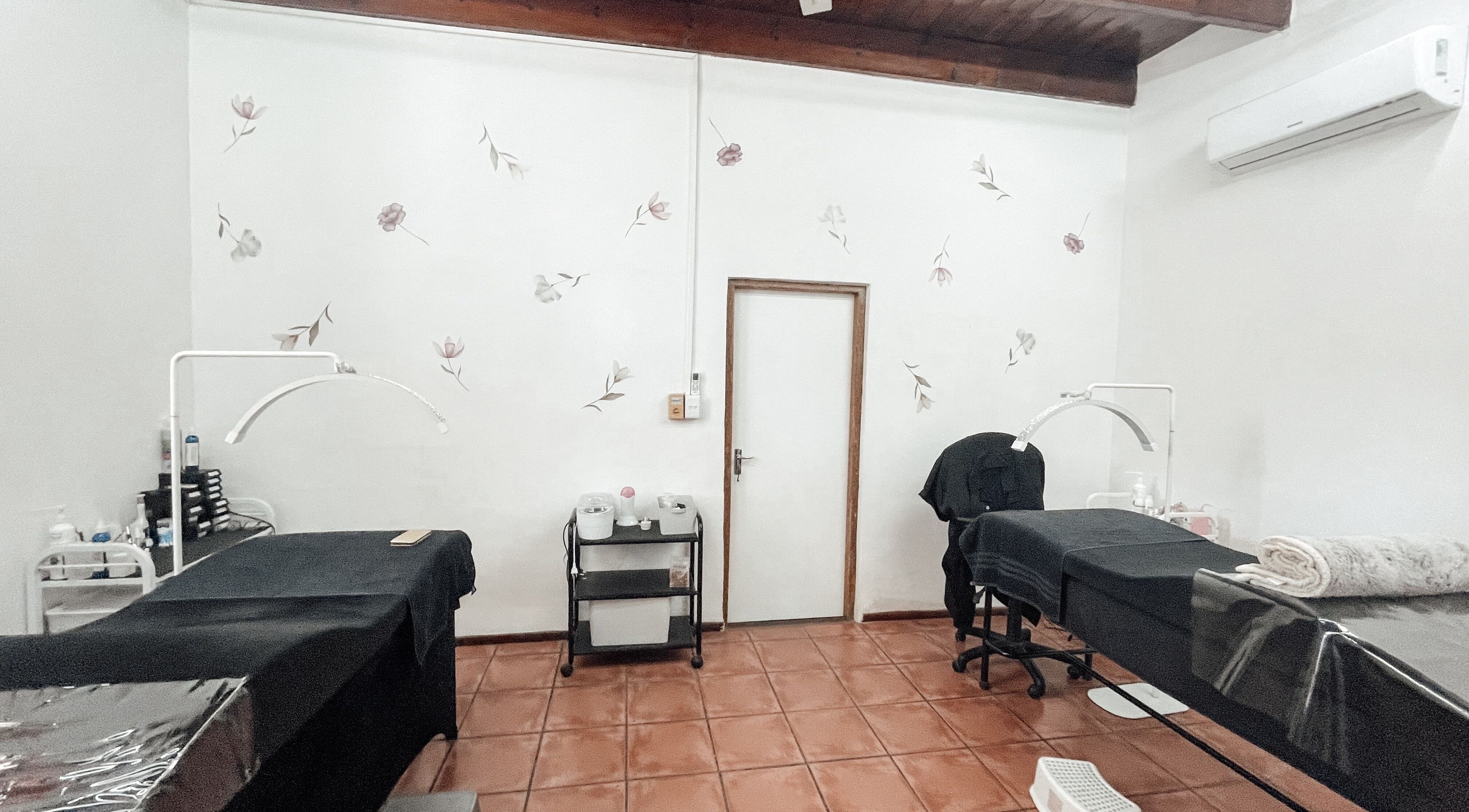 Peaceful treatment room at Winelands Body Aesthetics, Wellington, Western Cape, ZA with calming decor.