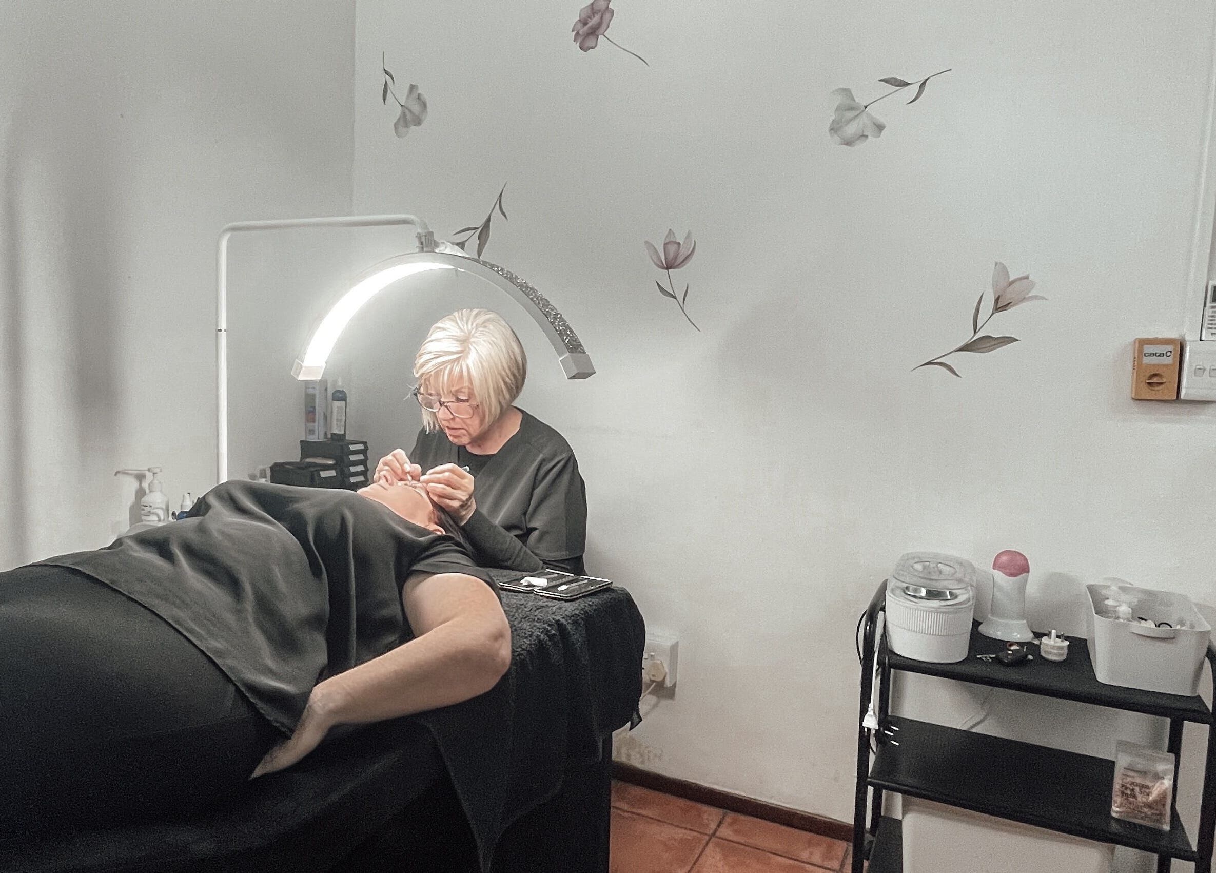 Expert beauty care at Winelands Body Aesthetics, Wellington, Western Cape, ZA. A serene spa treatment room.