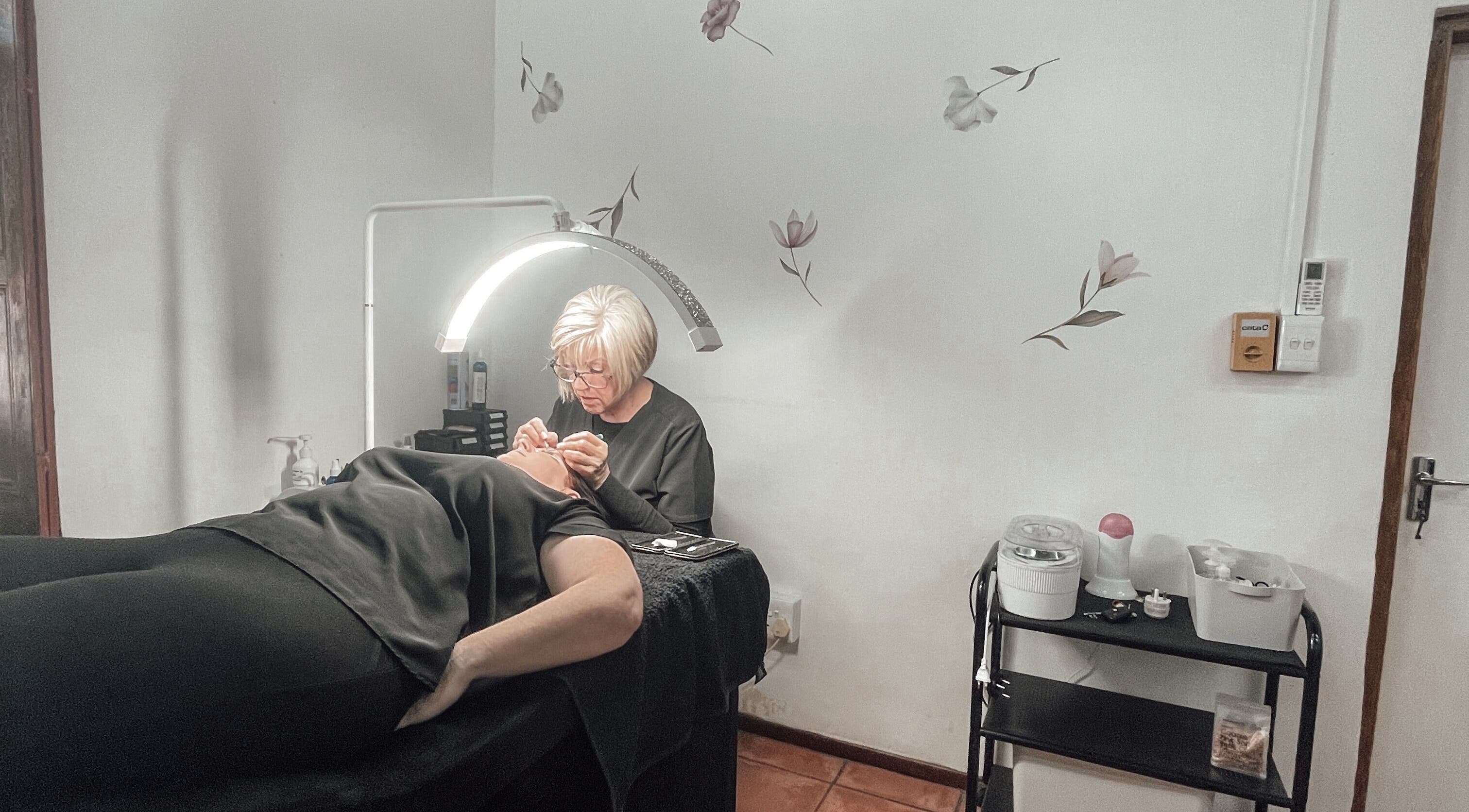 Expert beauty care at Winelands Body Aesthetics, Wellington, Western Cape, ZA. A serene spa treatment room.