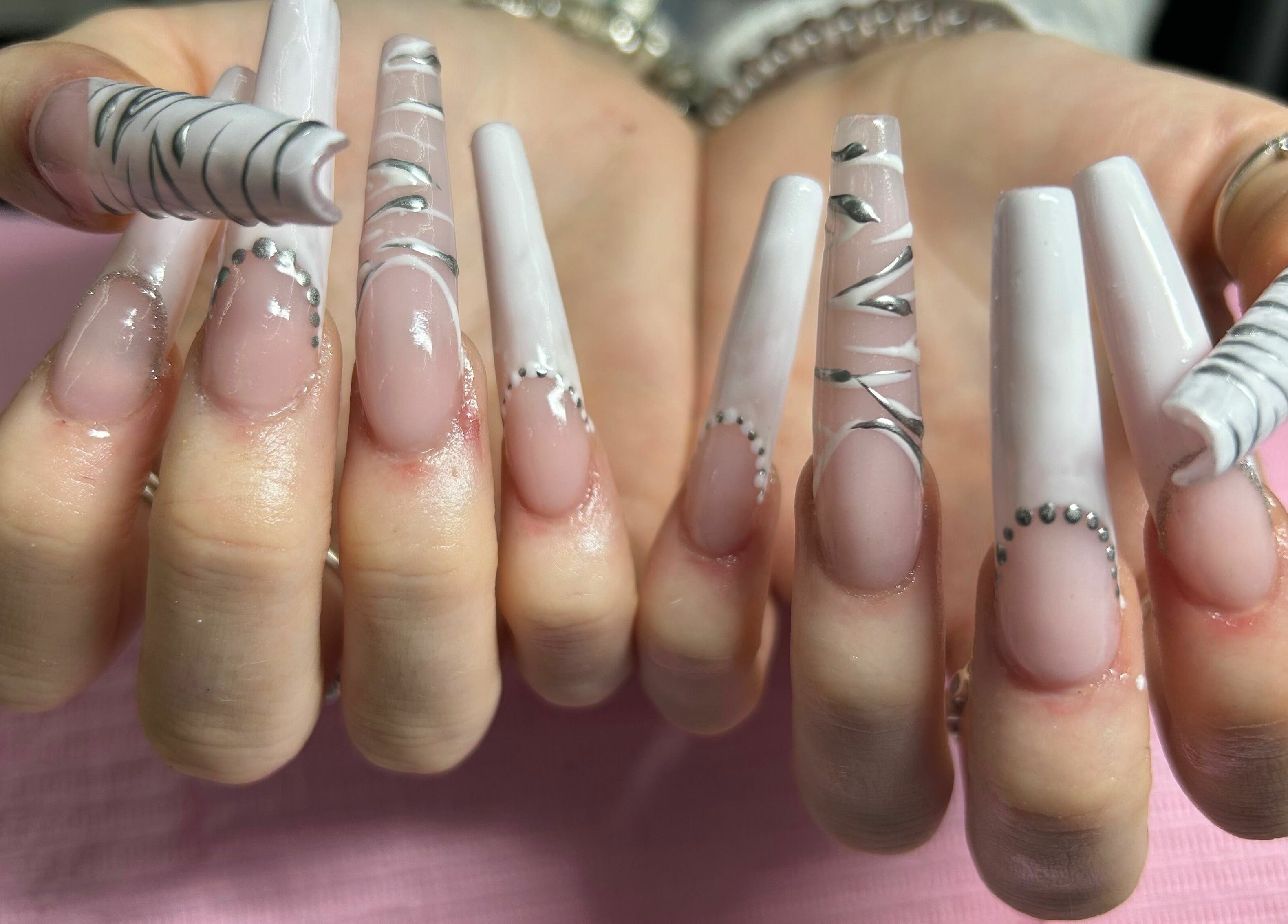 Stylish long nail designs at Nailed It!, Sauchie, Scotland, GB.