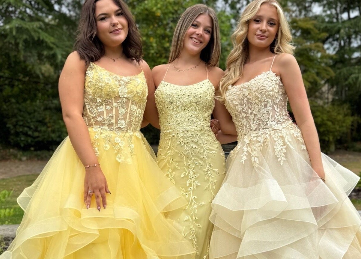 Three women in elegant gowns at The Prom Den - Horsforth, Horsforth, England, GB, showcasing prom fashion.