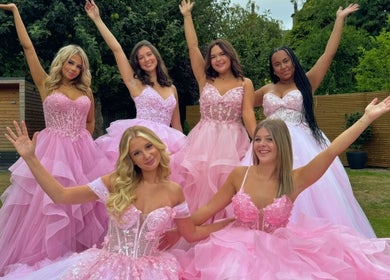 Group of women in pink dresses at The Prom Den - Horsforth, Horsforth, England, GB, showcasing prom styles.