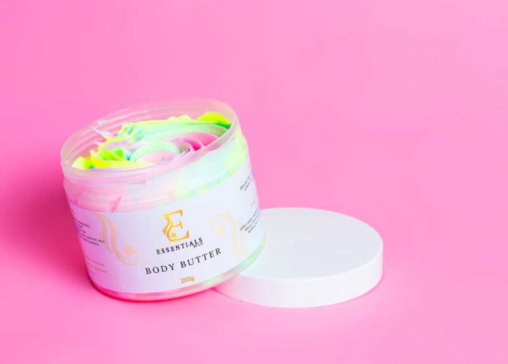 Vibrant body butter by Essentials by L.T in Midrand, Gauteng, ZA against a pink background.