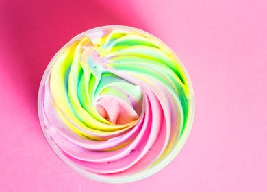 Colorful rainbow swirl in a jar from Essentials by L.T, Midrand, Gauteng, ZA, perfect for vibrant skincare.