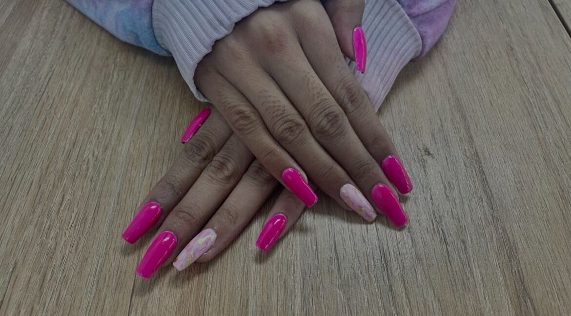 Stylish pink manicure from Jeweled by Jules, Ottawa, Ontario, CA. Perfect nail art for elegance seekers.
