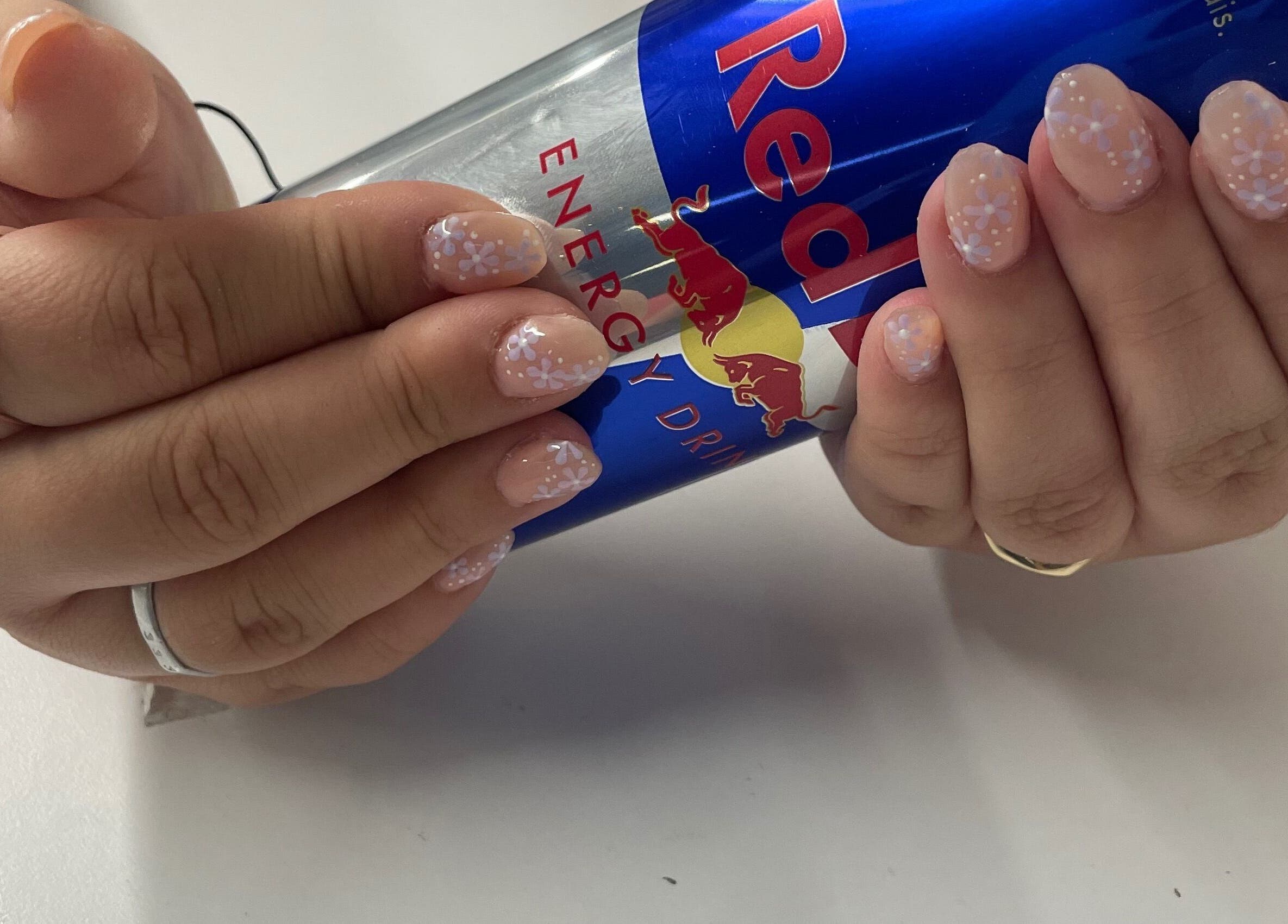 Delicate floral nail art at Jeweled by Jules, Ottawa, Ontario, CA.