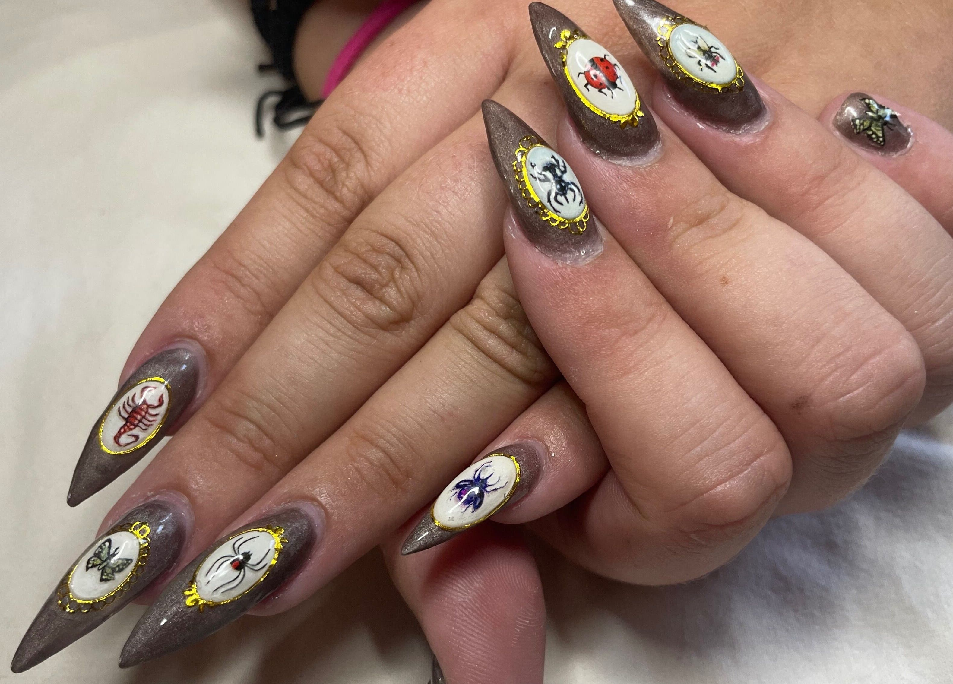 Detailed artistic nail design at Jeweled by Jules, Ottawa, Ontario, CA.