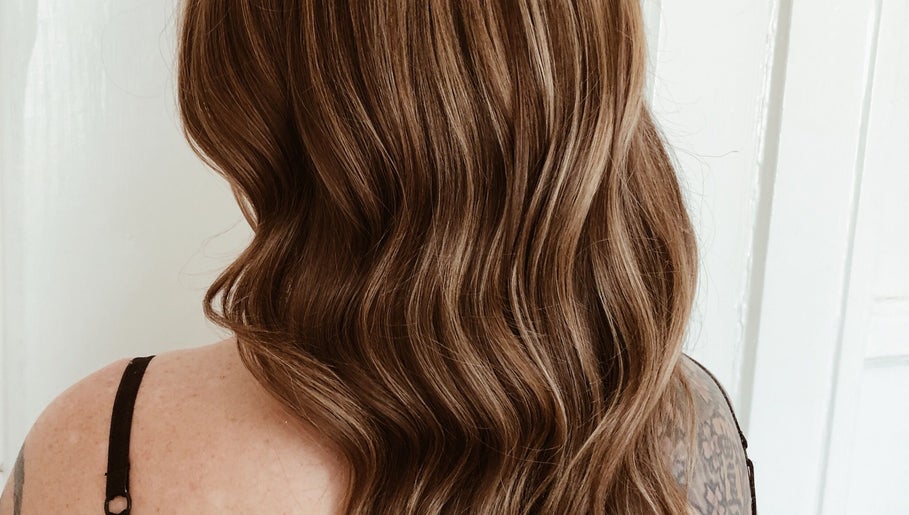 Beautiful wavy brown hair styled at Southern Siren Studio, Jacksonville, Florida, US.