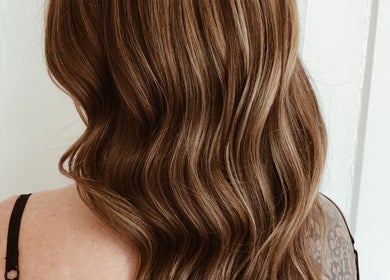 Beautiful wavy brown hair styled at Southern Siren Studio, Jacksonville, Florida, US.