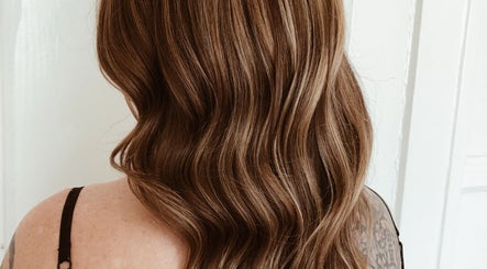 Beautiful wavy brown hair styled at Southern Siren Studio, Jacksonville, Florida, US.