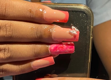 Elegant pink acrylic nails with floral design at Deluxee Nails By Abby, Draxhall, St. Ann Parish, JM.