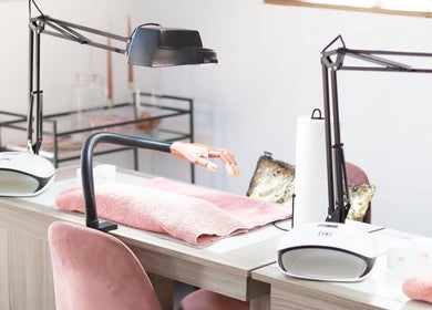 Modern nail station at Blush Nail Boutique, Pretoria, Gauteng, ZA featuring stylish equipment and pink accents.