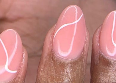 Unique nail art design at Blush Nail Boutique, Pretoria, Gauteng, ZA. Features pink polish with white lines.