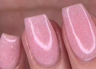 Close-up of shimmering pink manicure at Blush Nail Boutique, Pretoria, Gauteng, ZA.