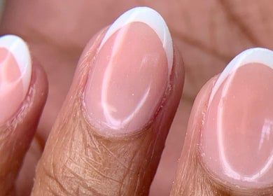 French manicure at Blush Nail Boutique, Pretoria, Gauteng, ZA, showcasing elegant nail art.