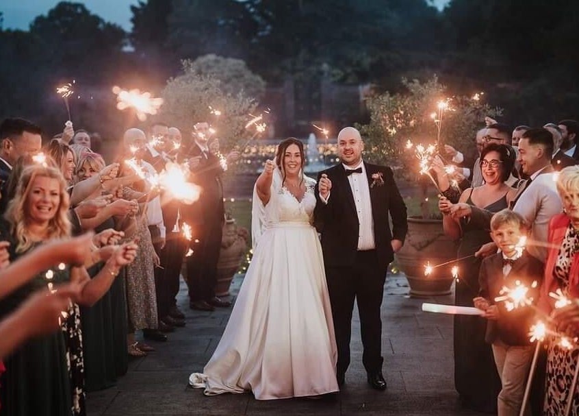 Wedding party with sparklers at JOAM Glow Spray Tanning, Hairdressing, Waxing, Weddings Peterborough, England, GB.