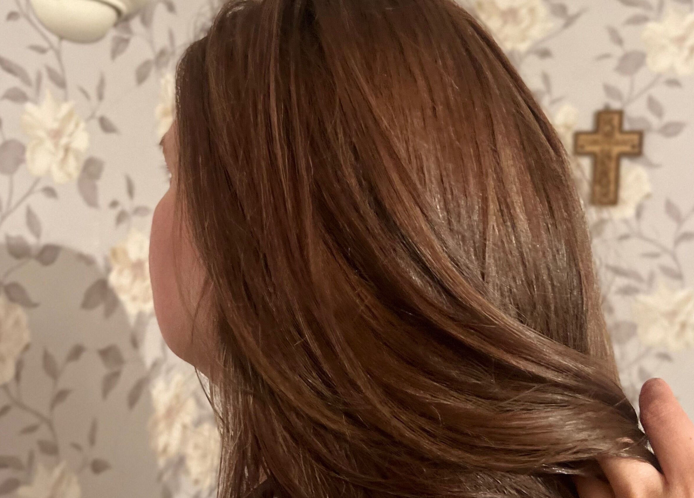 Glossy brunette hair styled at JOAM Glow Spray Tanning, Hairdressing, Waxing, Weddings Peterborough, England, GB.