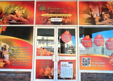 Front window of Liverpool Nice Remedial & Thai Massage in Liverpool, New South Wales, AU, with massage offers.