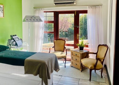 Relaxing treatment room at Mirabella Aesthetics Health & Beauty Clinic, Pretoria, Gauteng, ZA with natural light.